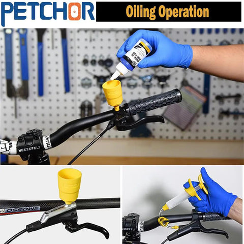 Image of a Hydraulic Disc Brake Bleed Kit For Mountain Bikes With 13 Quick Connect Joints And Funnels being used on a bike handlebar.