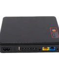 Real Talk Solid Mini UPS Battery Backup Providing 20800Mah Capacity For Router Modem And Security Cameras With 5V 9V 12V Outputs Plus Standard US Plug showing input/output ports on the back.