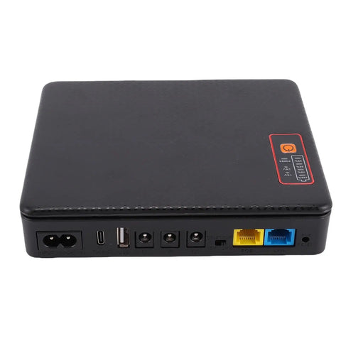 Real Talk Solid Mini UPS Battery Backup Providing 20800Mah Capacity For Router Modem And Security Cameras With 5V 9V 12V Outputs Plus Standard US Plug showing input/output ports on the back.