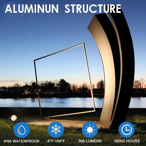 View of modern sculpture at sunset highlighting Warm White 5W Low Voltage Landscape Lights Set Outdoor Gardens Walkways Waterproof.
