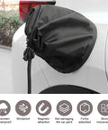 Badass Waterproof EV Charger Port Cover with Smack Shut Magnetic Lock offers sleek black protection for EV charging ports.