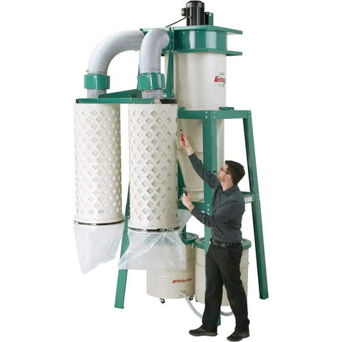 Rugged Seven Point Five Horsepower Three Phase Cyclone Dust Collector with dual filters and user adjusting suction features.