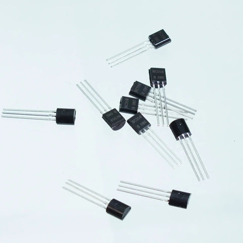 Scattered transistors from the Assorted TO92 Transistor Kit With 840 Pieces, 24 Values, NPN And PNP Bipolar Transistors For DIY Projects And Circuit Design