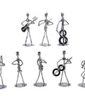 Premium Hand Welded Music Note Statues Set Of Eight Slick Industrial Wire Sculptures For Boss Level Desk Or Shelf Decor, eight metal musicians on stands.