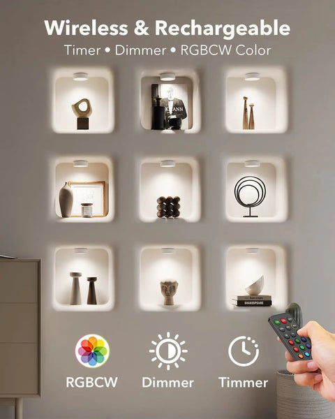 Rechargeable Puck Lights With Remote Control 2400mAh USB C Rechargeable Tap Lights illuminating wall decor.
