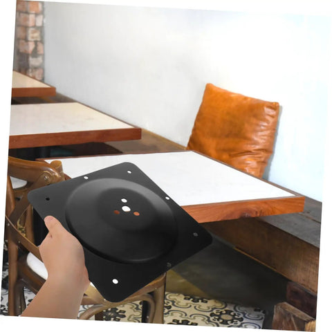 Built Different Square Metal Table Leg Connectors Quick Snap Fit Design For Reliable Sofa And Bench Hardware Straight Setup Heavy Duty Black Iron Furniture Mounting Plates in a hand.
