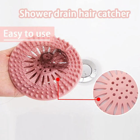 Five Pack Heavy Duty Silicone Hair Catcher Drain Stopper For Shower Tub Kitchen Sink reusable strainer in hand with hair caught.