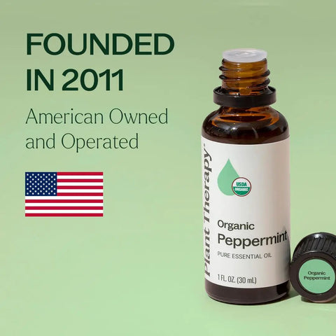Bottle of Cool Mint Peppermint Essential Oil 10 mL, 100 Percent Pure Organic, USDA Certified Organic Aromatherapy Oil next to cap.