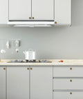 Antique Brass Cabinet Knobs 10 Pack For Kitchen Cabinets And Drawers Premium Alloy Hardware installed on white kitchen cabinets