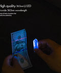 Testing currency authenticity with Rechargeable USB C EDC Flashlight Keychain Mini Light 650 Lumens Ultra Bright Compact Pocket Torch