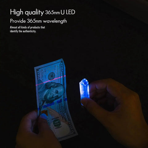 Testing currency authenticity with Rechargeable USB C EDC Flashlight Keychain Mini Light 650 Lumens Ultra Bright Compact Pocket Torch