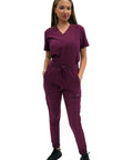 Women's Slim High Waisted Jogger Scrub Pants Yoga Style Nursing Uniforms Wine Color, model wearing buttery soft healthcare workwear.