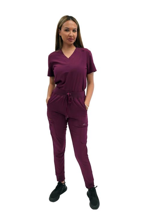 Women's Slim High Waisted Jogger Scrub Pants Yoga Style Nursing Uniforms Wine Color, model wearing buttery soft healthcare workwear.