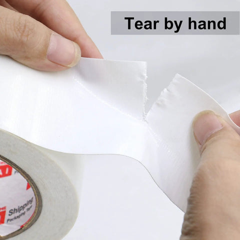 Hands tearing Heavy Duty White Duct Tape 2 Inch By 30 Yards 3 Pack 8.27 Mil All Weather Tear By Hand No Residue product.