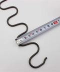 Heavy Duty Compression Spring Repair Kit With Screws Included measured with tape, showing length for DIY applications