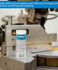 Go-To Solid Industrial Lubricant For Minimum Quantity Lubrication MQL Push Tube shown by a machine, 3.5 oz packaging