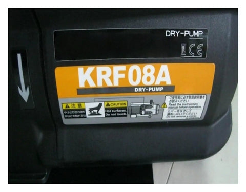 Close-up of Rock Solid Vacuum Pump Built For Industrial Automation And High Accuracy Needs featuring KRF08A label and caution sign.