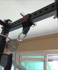 6 Pack 4 Inch Heavy Duty Single Pulley Block Swivel Roller mounted on gym equipment