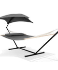 Standing Patio Hammock With Canopy And Foldable Stand, Portable And Easy Setup, Patent Pending, Dark Gray, Two Layer Quilted Polyester Comfort For Camping And Outdoor Kickback Lounging, shown from side view.