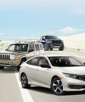 Three vehicles on a highway with a desert backdrop, featuring a blue Ford truck, a beige SUV, and a white sedan.