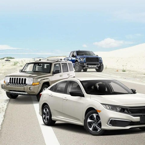 Three vehicles on a highway with a desert backdrop, featuring a blue Ford truck, a beige SUV, and a white sedan.
