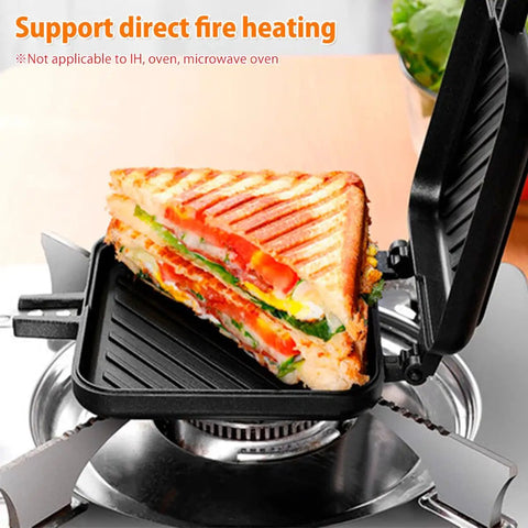 Durable Aluminum Grilled Sandwich Maker For Stovetop Use with toasted sandwich on burner, showing non-stick surface.