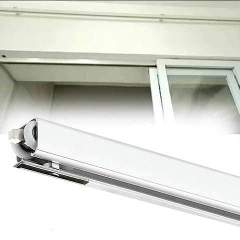 Badass Slick Sliding Barn Door Track Kit With Thick Aluminum Rail And Silky Nylon Rollers Supporting 440 Pounds close-up view of rail and roller.