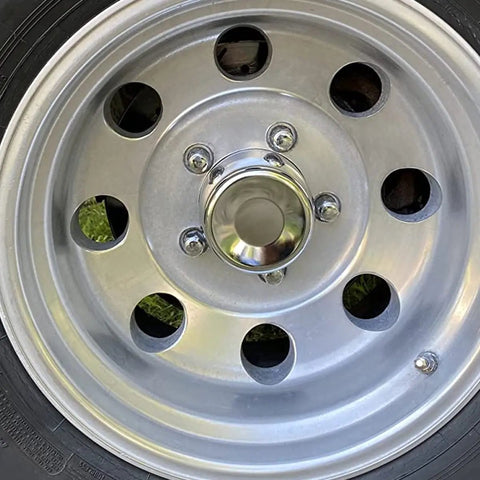 Chrome steel trailer wheel with 4 Pack Chrome Steel Trailer Wheel Center Caps Push Thru 4.25 Inch Center Bore, Water Resistant And Anti Rust.