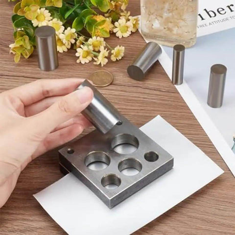 Hand using 5 Piece Disc Cutter Set For Metal Jewelry Making With Round Punch Sizes 1/2, 5/8, 3/4, 7/8, And 1 Inch