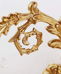 Close-up of the detailed gold leaf design on Modern Brass Wall Sconces With Glittering Acrylic Jewel Drops For Bedroom Living Room Hallway Lighting Energy Saving Decor Fixture That Hits Different And Kicks Up Serious Style.