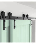Bypass Barn Door Sliding Track Kit For Double Doors 4 To 16 Feet J Shaped Hanging Rails System Matte Black Steel Hardware installed view