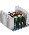 Kickstart Your Builds With This Built Tough 300W 20A Adjustable Buck Converter Step Down Regulator showing copper terminals and cooling fins.