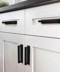 Heavy Duty Peel And Stick Cabinet Handles Six Inch Black Adhesive Drawer Pulls on white cabinetry.