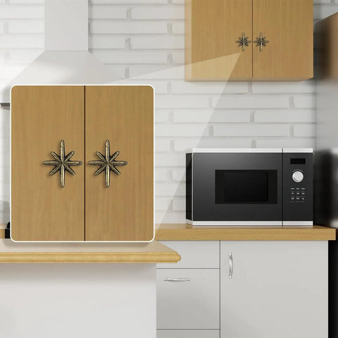 Six Piece Antique Gold Cast Iron Drawer Pulls And Cabinet Knobs Set With Eight Pointed Star Burst Design on kitchen cabinet doors