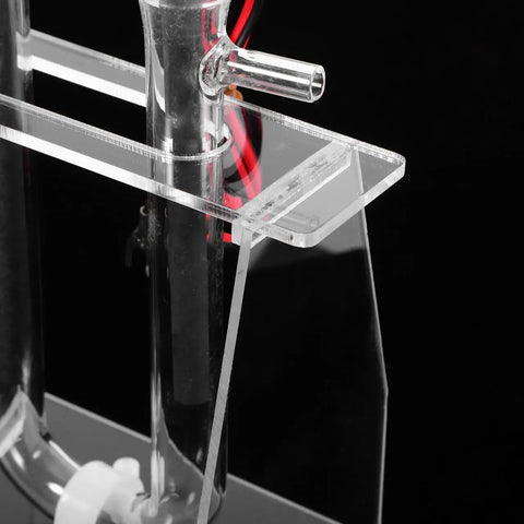 Close-up of Hands-On Water Electrolysis Demonstration Kit for Science Class, clear acrylic setup for electrochemical display.