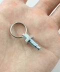 Heavy Duty M6 Stainless Steel Spring Plungers With Pull Ring 4 Pack Non Locking Telescopic Thumb Pin held in hand.