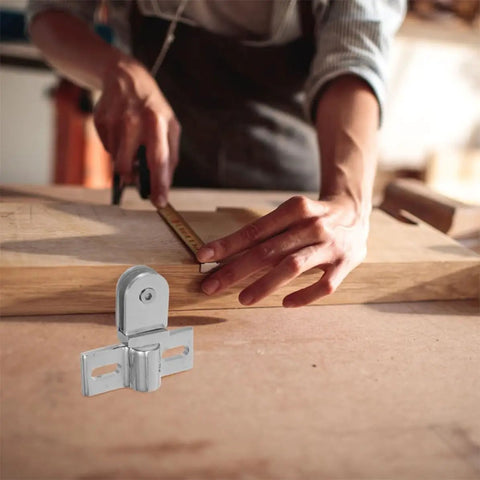 Person measuring wood next to Zinc Alloy Door Hinge Pivot Set for Glass Doors, Stable Fit, Easy Install, Silver Finish