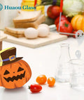 3 Piece Glass Beaker Set Lab Gear With 50ml 100ml 250ml Low Form Borosilicate 3.3 Beakers on Halloween-themed lab bench