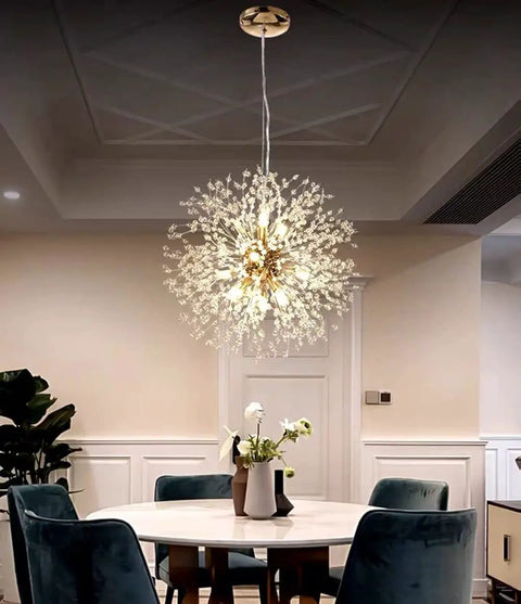 Gold 9 Light Crystal Ceiling Chandelier Pendant Lighting Fixture for Dining Room with modern sparkling crystals above table.