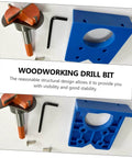 Hinge boring drill bit set, front view, blue mounting jig blocks (2) and orange-handled bits with hex key.