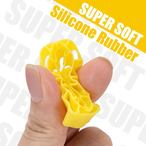 Close-up of a yellow silicone rubber tire insert for 0.7 inch 39-41mm SCX30 RC car tires showing its super soft flexibility.