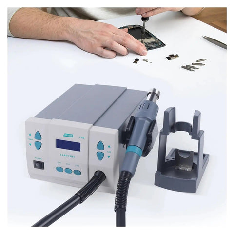 Powerful 1000W Soldering Hot Air Rework Station With Digital Display And Adjustable Airflow in use for mobile phone PCB repair.