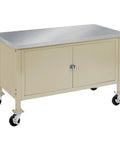 Beefy Roll Around Workbench With Secure Locking Storage Cabinet And Heavy Duty Smooth Gliding Casters Clean Stainless Steel Flat Top 72 By 30 Inch Shop Station Tan, featuring a tan cabinet and wheels.