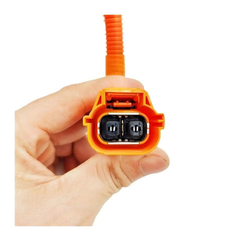 Heavy Duty 409V AC Air Conditioning Compressor For Byd Qin EV Electric Vehicles Connector held in hand, showcasing cable attachment.