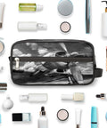 Travel Toiletry Bag For Men Women Kids Waterproof Dopp Kit Organizer With Spacious Compartments centered among toiletries
