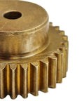 Close-up of a 0.75 Module Copper Cylindrical Spur Gear 43 Teeth 15mm Bore With Step Mechanical Pinion Shaft Hardware
