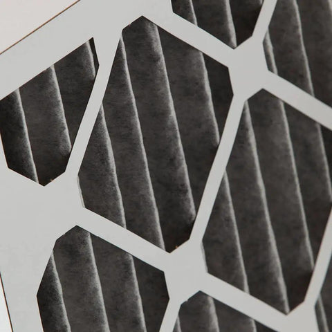 Close-up of MERV 12 Pleated Furnace Air Filter With Activated Carbon Odor Control, 16x25x2 Inches, showing pleats and frame.