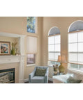 No Tools Needed Arch Window Shade White Pleated Fabric Light Blocking Privacy Shade With Peel And Stick Install For 72 W By 36 H Half Round Arch Windows installed in cozy living room.