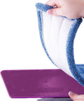 Hand showing Heavy Duty Washable Microfiber Cleaning Pad Fits Standard Floor Mops, showcasing its blue microfiber texture.