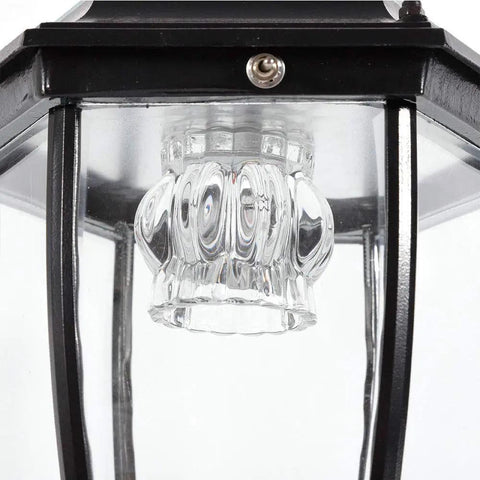 Close-up of Outdoor Solar Post Lights 2 Pack Waterproof LED Landscape Lanterns showing black frame and glass detail